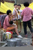 Quake victims stay outside